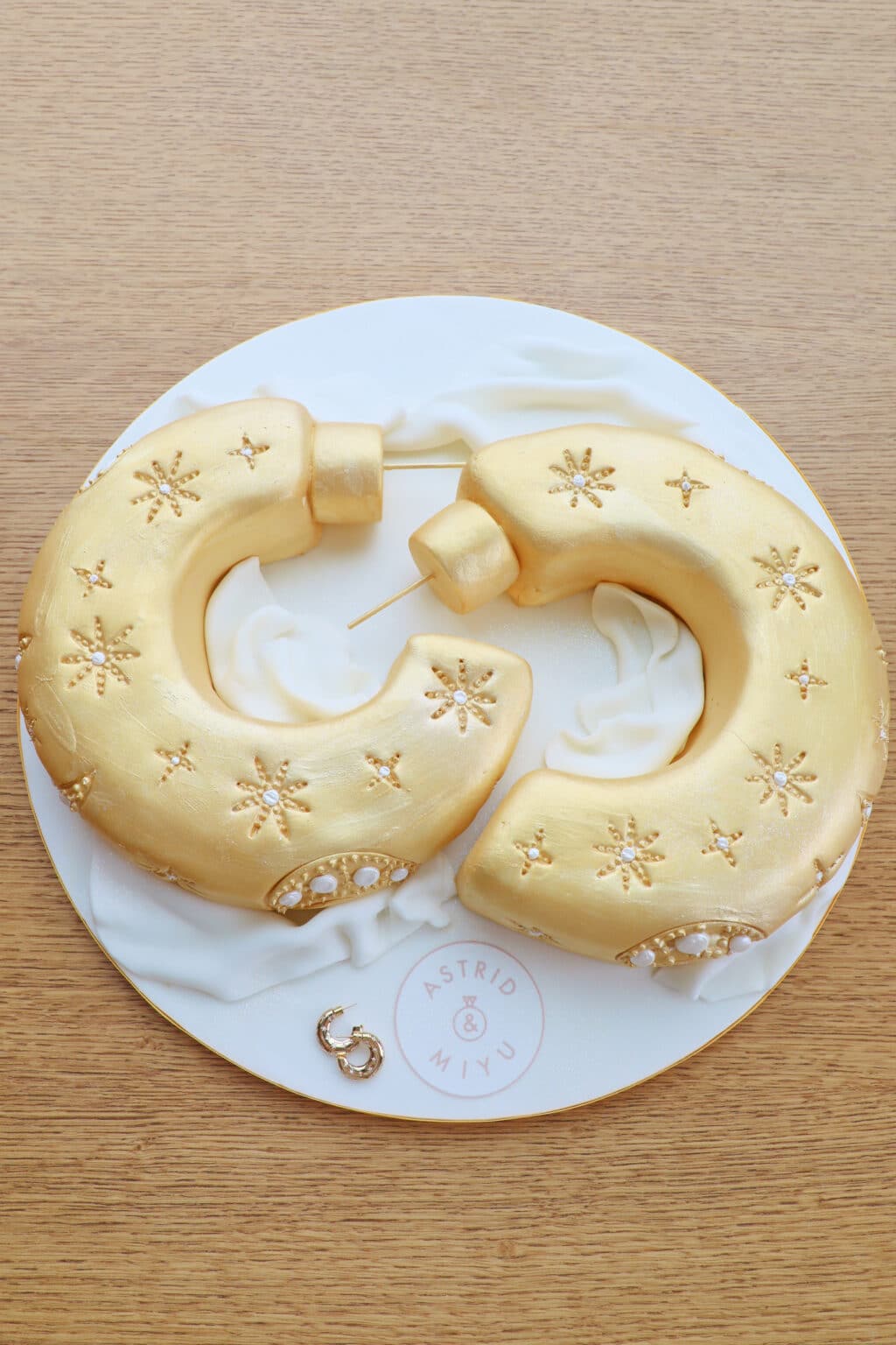 image of bespoke earring birthday cake for london jewellery company