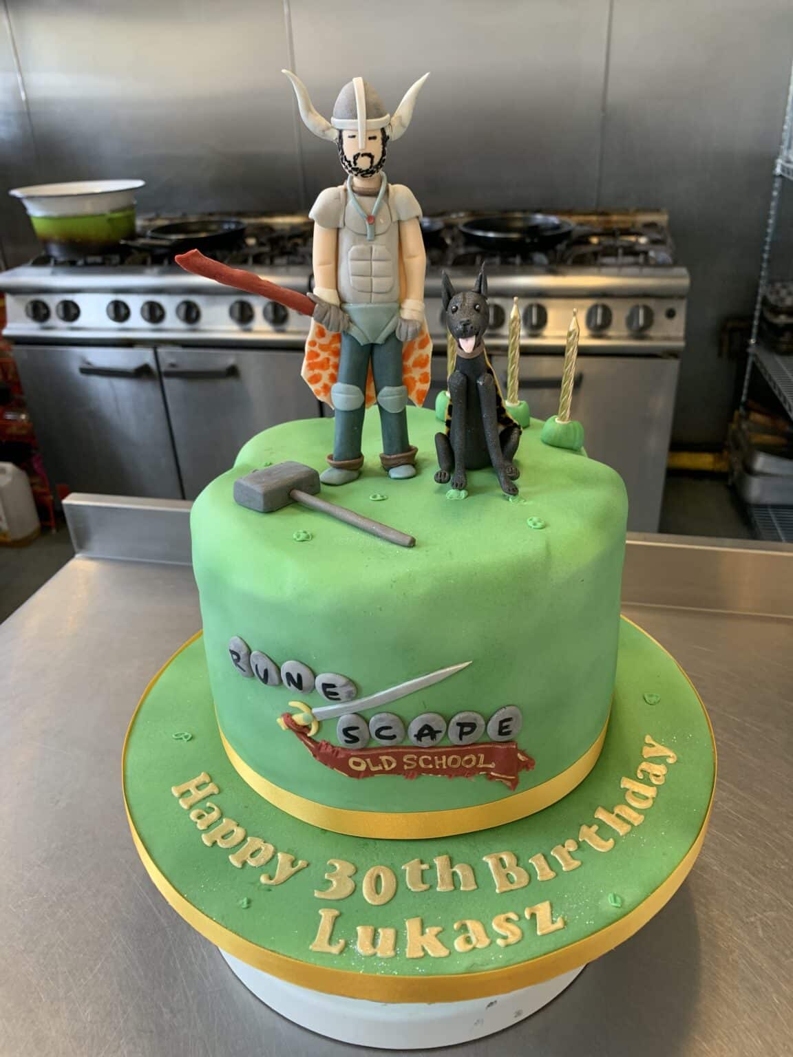 old school Runescape novelty birthday cake - dog and character on realistic designed cake